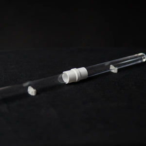 White connector joining two ant test tubes