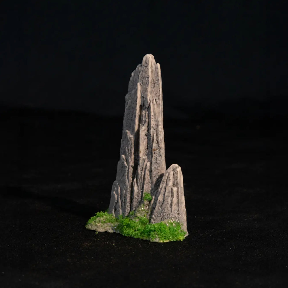 Miniature moss-covered spire rock habitat decoration