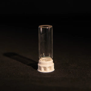 Ant nectar dispenser in a clear tube with white base
