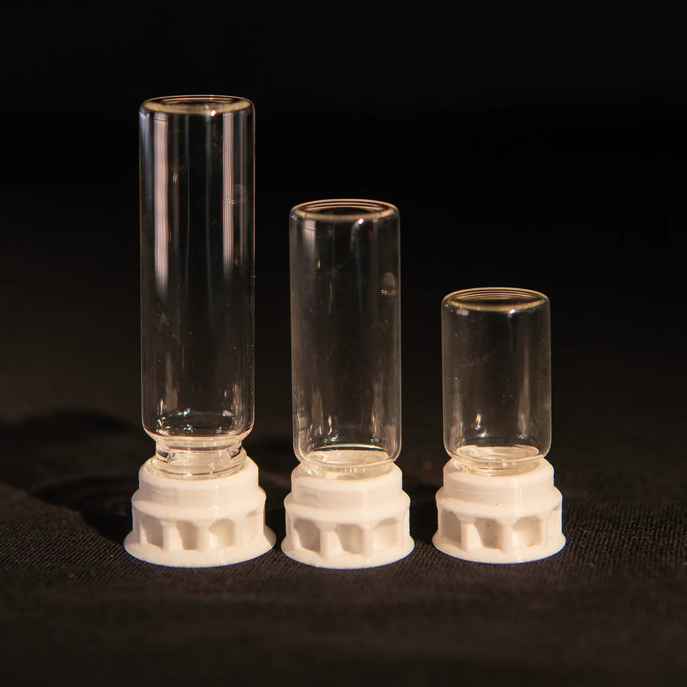 Ant nectar dispenser in a clear tube with white base