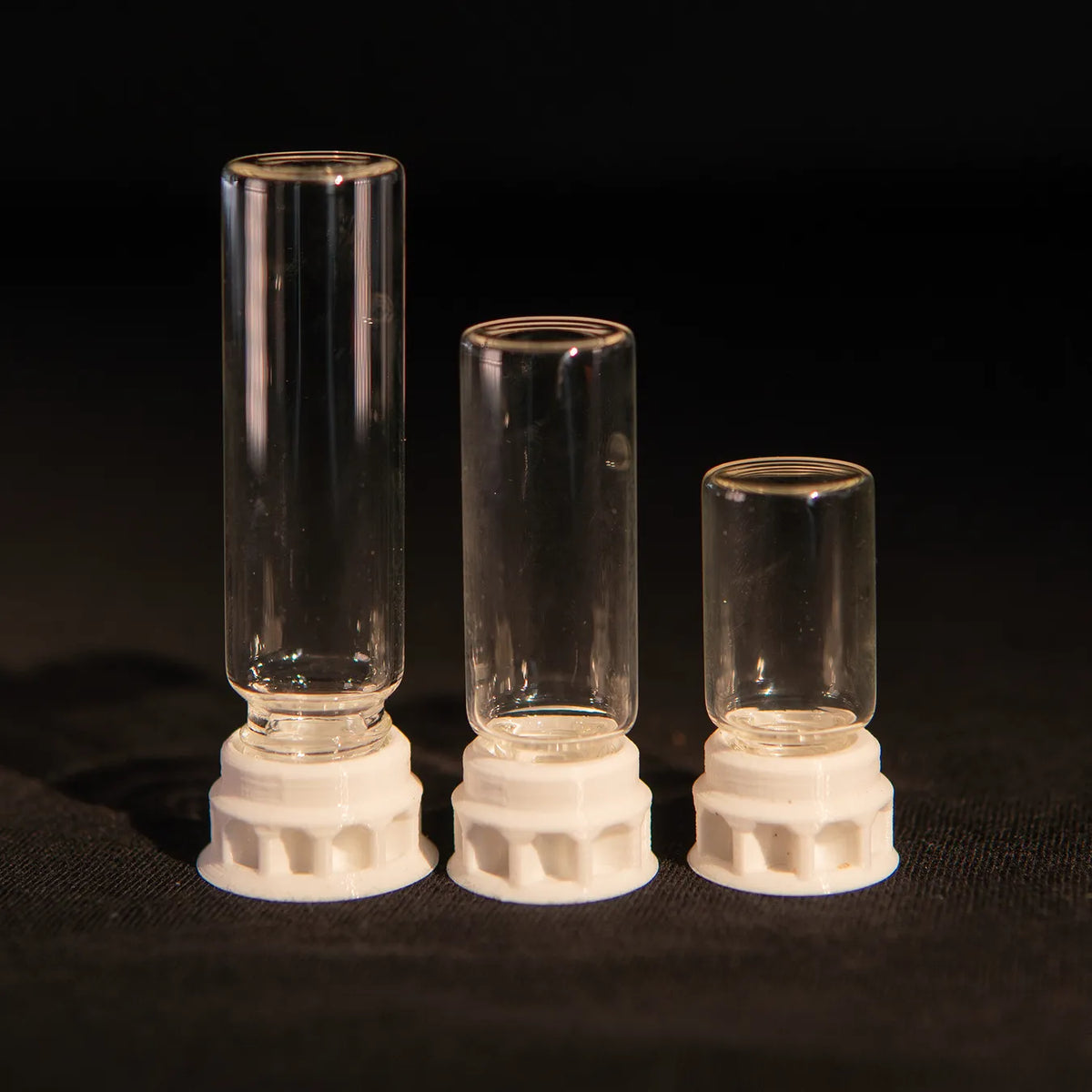 Ant nectar dispenser in a clear tube with white base